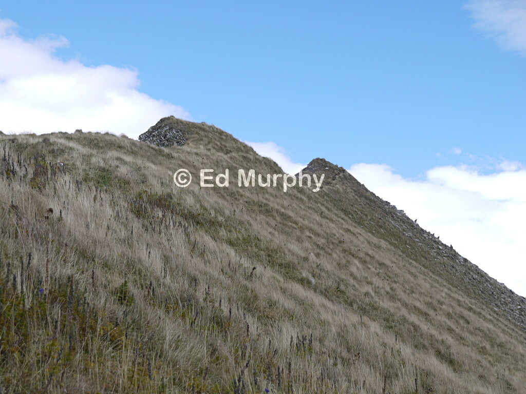 Keeping just below the path to avoid wind near the summit of the First