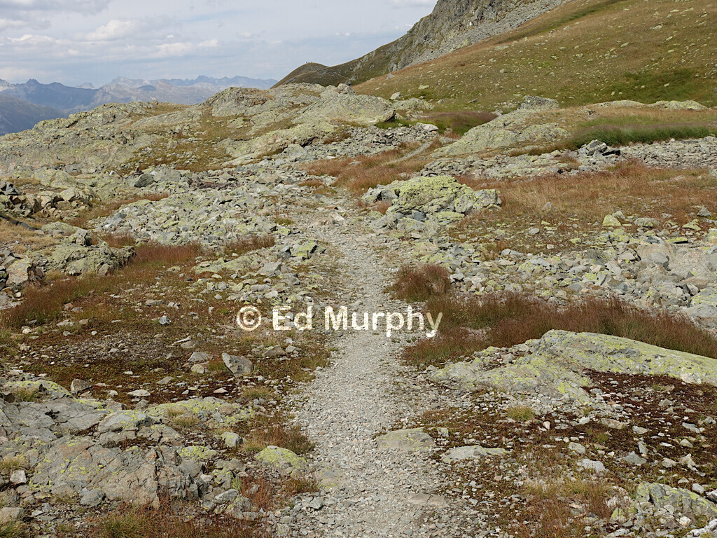 Warm colours on the path to Piz da l'Ova Cotschna